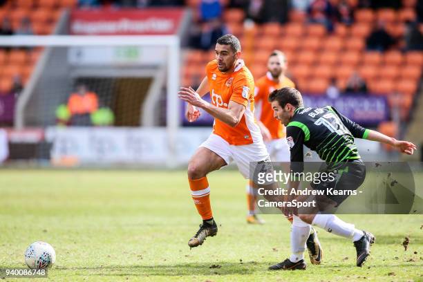 Blackpool's Colin Daniel gets away from Doncaster Rovers' Matty Blair during the Sky Bet League One match between Blackpool and Doncaster Rovers at...
