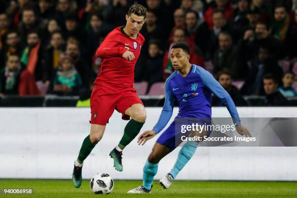 Cristiano Ronaldo of Portugal, Kenny Tete of Holland during the International Friendly match between Portugal v Holland at the Stade de Geneve on...