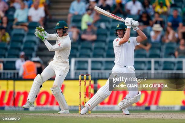 South African batsman AB de Villiers plays a shot on the first day of the fourth Test cricket match between South Africa and Australia at Wanderers...