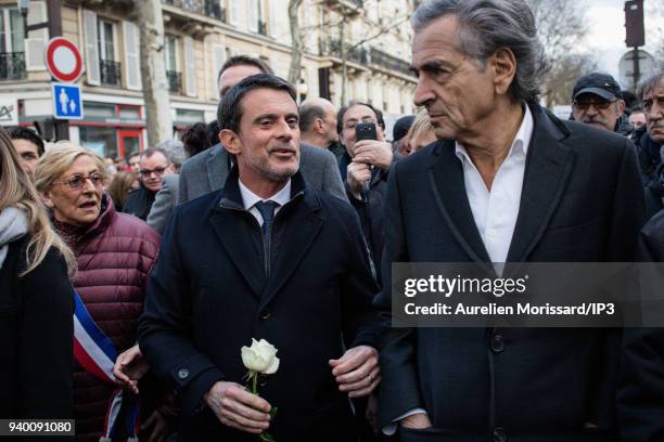 Former Prime Minister Manuel Valls and the writer and philosopher Bernard Henry Levy at the Silent March In Memory Of Mireille Knoll who survived the...