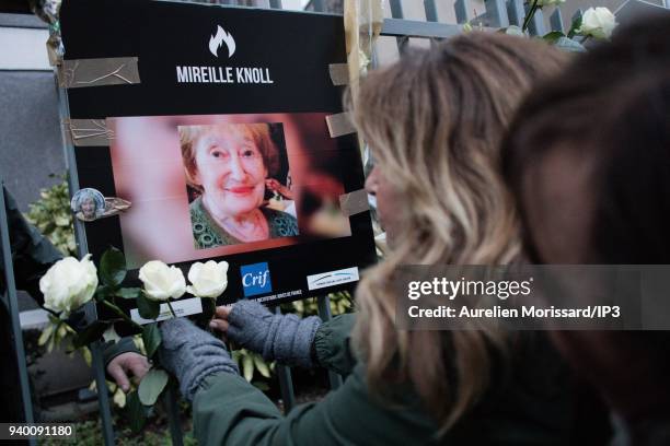 People recollect on the sidelines of the Silent March In Memory Of Mireille Knoll who survived the Holocaust but was recently murdered in her home on...