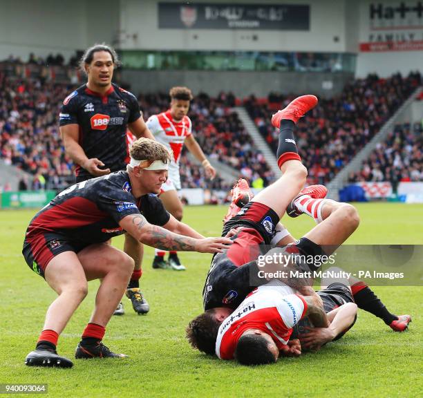 St Helens' Zeb Taia scores a try during the Super League match at the Totally Wicked Stadium, St Helens.