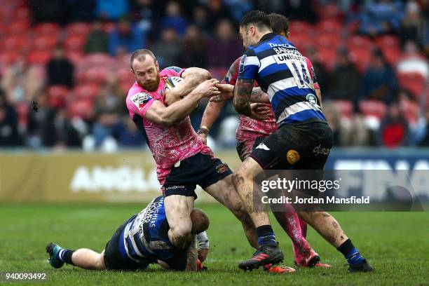 James Short of Exeter Chiefs is tackled by Tom Homer of Bath during the Anglo-Welsh Cup Final between Bath Rugby and Exeter Chiefs at Kingsholm...