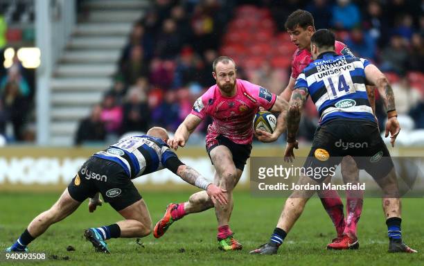 James Short of Exeter Chiefs is tackled by Tom Homer of Bath during the Anglo-Welsh Cup Final between Bath Rugby and Exeter Chiefs at Kingsholm...