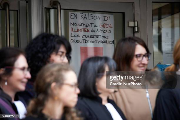 Lawyers staying in front of the entrance of the Court of First Instance of Toulouse where a paper reads 'No consultations due to lawyers's strike'....