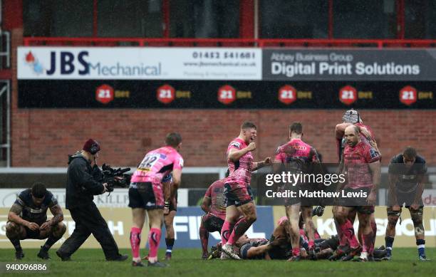 Exeter Chiefs players celebrate after winning the Anglo-Welsh Cup Final between Bath Rugby and Exeter Chiefs at Kingsholm Stadium on March 30, 2018...