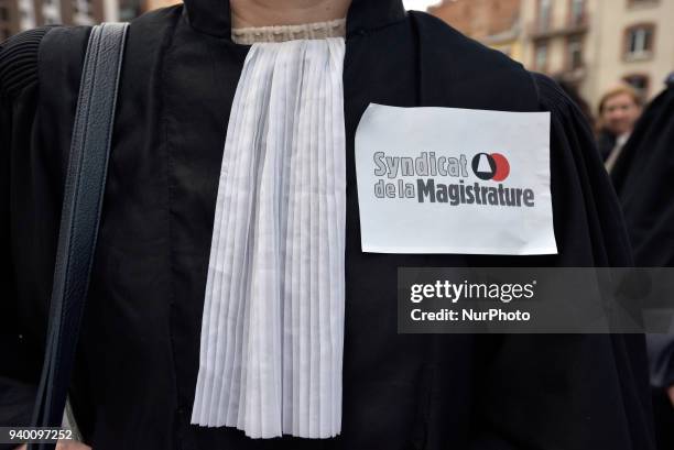Judge wears a sticker of the 'Magistrate Union' .The French Bar Association, all lawyers' unions, all magistrates' unions called all its members to...