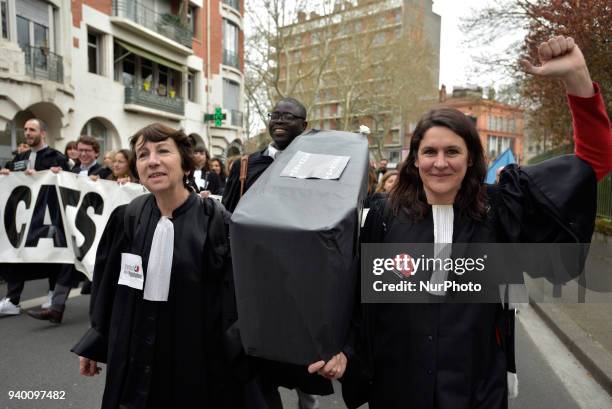 Lawyers holds a false coffin symbolizing the death of Court of First Instance during the protest. The French Bar Association, all lawyers' unions,...