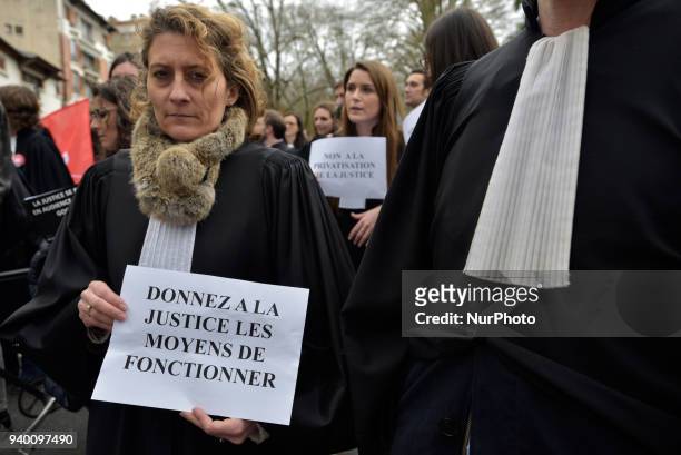 The lawyer holds a placard reading 'Give Justice the means to operate'. The French Bar Association, all lawyers' unions, all magistrates' unions...
