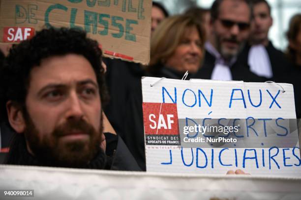 Placardreading 'No to Justice desert'. The French Bar Association, all lawyers' unions, all magistrates' unions called all its members to be on...