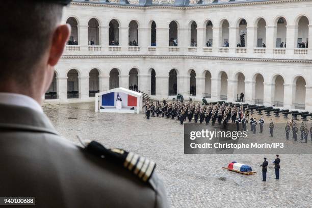 Military attends a national tribute to Colonel Arnaud Beltrame at Hotel des Invalides on March 28, 2018 in Paris, France. The French police officer...