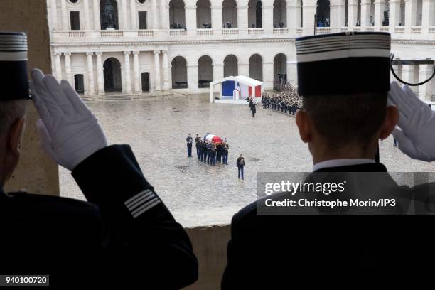 Military attend a national tribute to Colonel Arnaud Beltrame at Hotel des Invalides on March 28, 2018 in Paris, France. The French police officer...