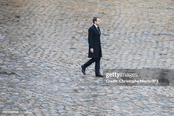 President of the Republic Emmanuel Macron attends a national tribute to Colonel Arnaud Beltrame at Hotel des Invalides on March 28, 2018 in Paris,...