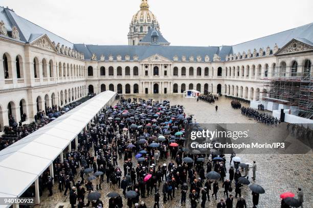 The public attends a national tribute to Colonel Arnaud Beltrame at Hotel des Invalides on March 28, 2018 in Paris, France. The French police officer...