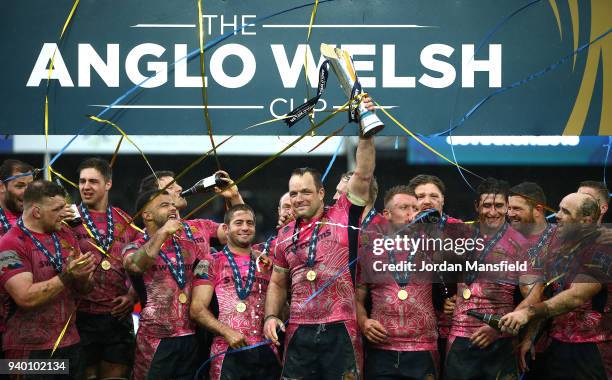 Kai Horstmann of Exeter Chiefs lifts the Anglo-Welsh Cup after wiining the Final between Bath Rugby and Exeter Chiefs at Kingsholm Stadium on March...