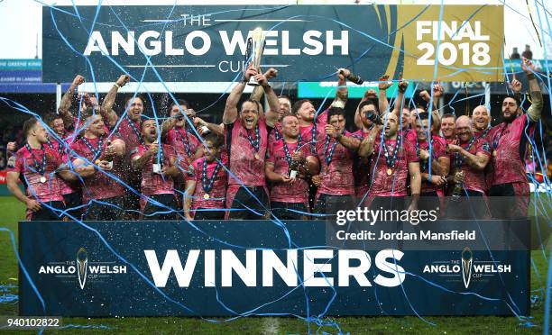 Kai Horstmann of Exeter Chiefs lifts the Anglo-Welsh trophy and celebrates with team mates after winning the Final between Bath Rugby and Exeter...