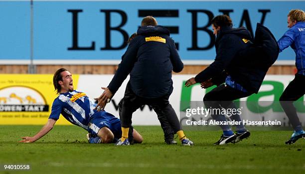 Christian Fuchs of Bochum celebrates scoring the 2nd goal with his team mates during the Bundesliga match between VfB Stuttgart and VfL Bochum at...