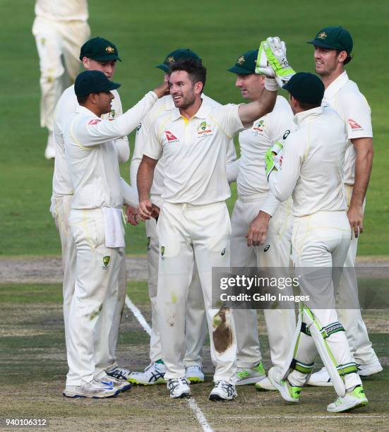 Chadd Sayers of Australia celebrates the wicket of AB de Villiers of the Proteas during day 1 of the 4th Sunfoil Test match between South Africa and...