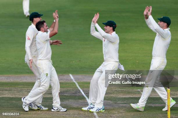 Chadd Sayers of Australia celebrates the wicket of AB de Villiers of the Proteas during day 1 of the 4th Sunfoil Test match between South Africa and...