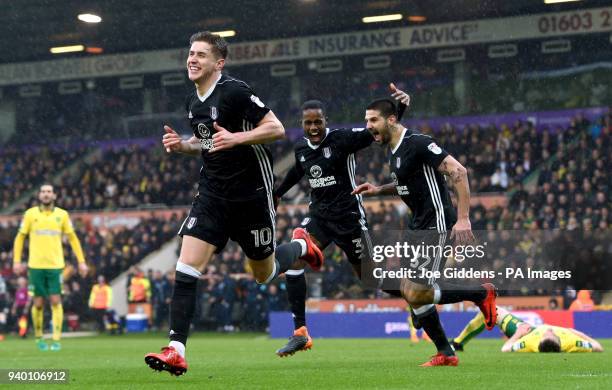 Fulham's Tom Cairney celebrates scoring his side's second goal of the game during the Sky Bet Championship match at Carrow Road, Norwich.