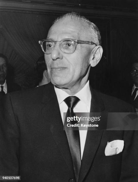 American film director George Cukor holds a press conference in Rome, Italy, where he in in negotiations for a new film, 8th April 1964.
