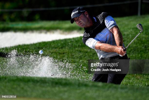 Ryan Armour plays a shot from the bunker near the seventh green during the second round of the Houston Open at the Golf Club of Houston on March 30,...