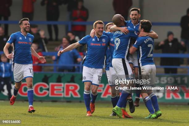 Ian Henderson of Rochdale celebrates after scoring a goal to make it 3-1 during the Sky Bet League One match between Rochdale and Shrewsbury Town at...