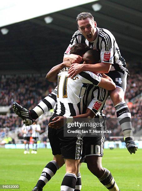 Peter Lovenkrands celebrates his opening goal with Marlon Harewood and Kevin Nolan during the Coca-Cola Championship game between Newcastle United...