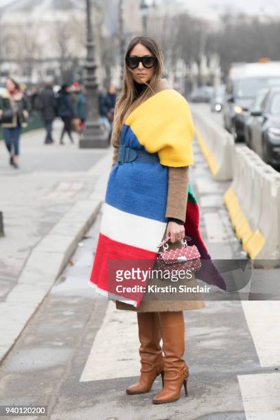 Fashion blogger Elisa Taviti wears Ralph Lauren boots, Valentino bag, Pace Style Concept coat, Asos scarf, Céline sunglasses and a Miu miu belt day 4...