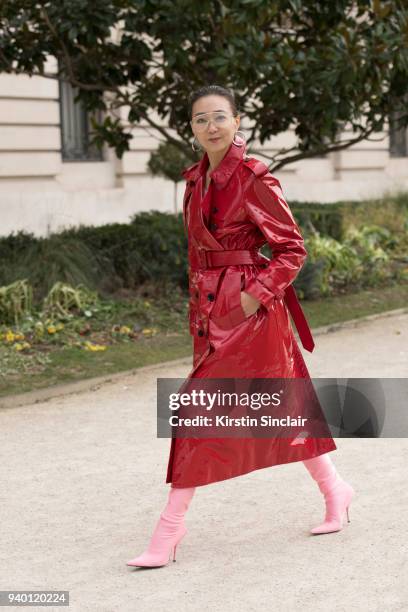 Digital director of Vogue Korea Jiyoung Kim wears a Burberry jacket, Balenciaga boots and Gentle Monster glasses day 4 of Paris Womens Fashion Week...