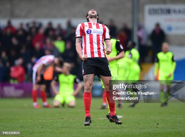 Lincoln City's Ollie Palmer celebrates following the Sky Bet League Two match between Lincoln City and Exeter City at Sincil Bank Stadium on March...