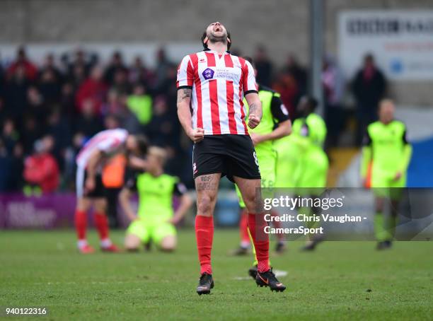 Lincoln City's Ollie Palmer celebrates following the Sky Bet League Two match between Lincoln City and Exeter City at Sincil Bank Stadium on March...