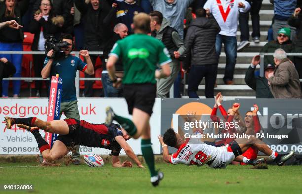 St Helens' Regan Grace scores a late try during the Super League match at the Totally Wicked Stadium, St Helens.