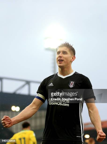 Tom Cairney of Fulham celebrates victory after the Sky Bet Championship match between Norwich City and Fulham at Carrow Road on March 30, 2018 in...