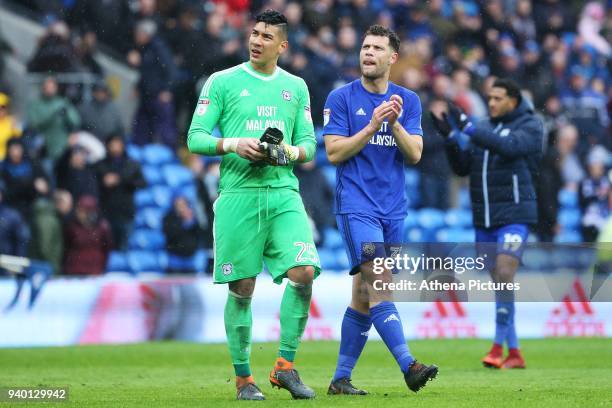 Neil Etheridge of Cardiff City and Yanic Wildschut the Sky Bet Championship match between Cardiff City and Burton Albion at the Cardiff City Stadium...