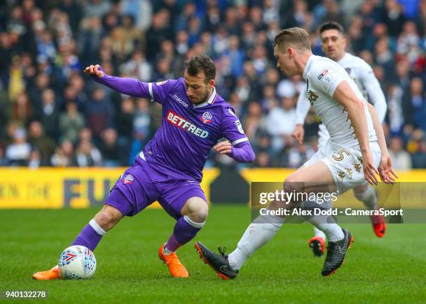 Bolton Wanderers' Adam Le Fondre takes on Leeds United's Matthew Pennington during the Sky Bet Championship match between Leeds United and Bolton...
