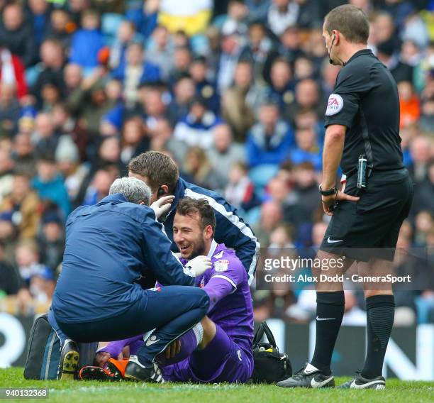 Bolton Wanderers' Adam Le Fondre receives treatment during the second half during the Sky Bet Championship match between Leeds United and Bolton...