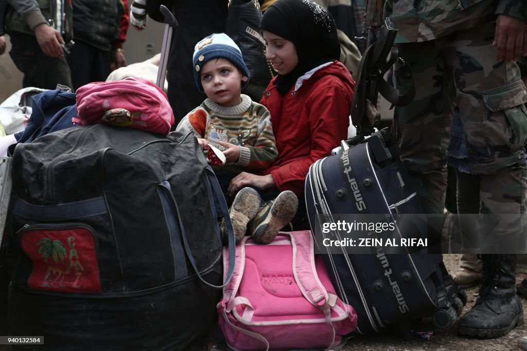 TOPSHOT-SYRIA-CONFLICT-GHOUTA-EVACUATIONS