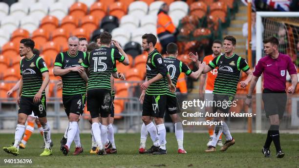 Doncaster Rovers' Tommy Rowe celebrates scoring his side's second goal with his team mates during the Sky Bet League One match between Blackpool and...