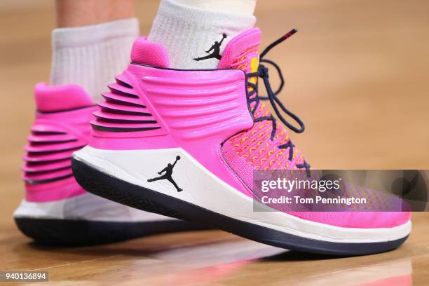 Detail view of the pink Nike Air Jordan 32 sneakers worn by the Michigan Wolverines during practice before the 2018 Men's NCAA Final Four at the...