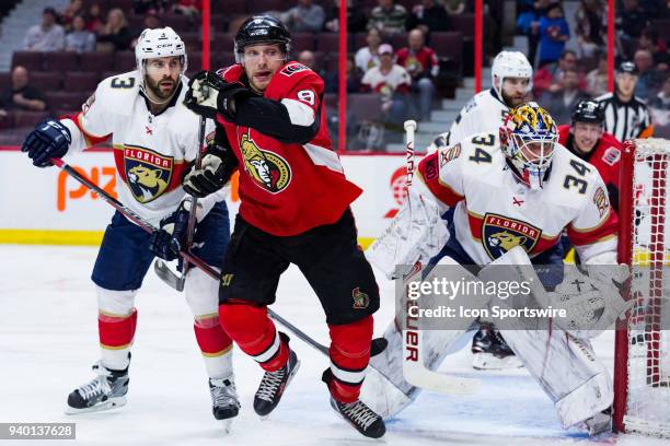 Ottawa Senators Right Wing Bobby Ryan breaks away from Florida Panthers Defenceman Keith Yandle in front of Florida Panthers Goalie James Reimer...