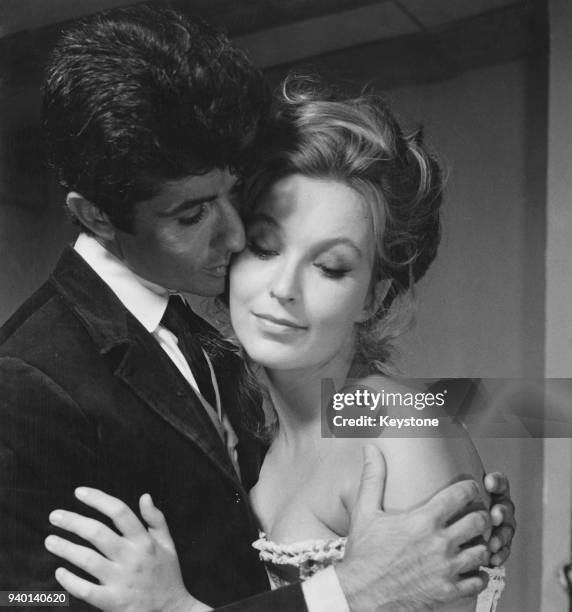 Actors George Chakiris and Marina Vlady star in the film 'Il ladro della Gioconda', , directed by Michel Deville, Italy, 31st August 1965.