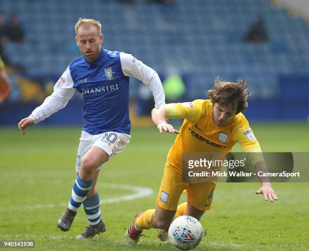 Preston North End's Ben Pearson battles with Sheffield Wednesday's Barry Bannan during the Sky Bet Championship match between Sheffield Wednesday and...