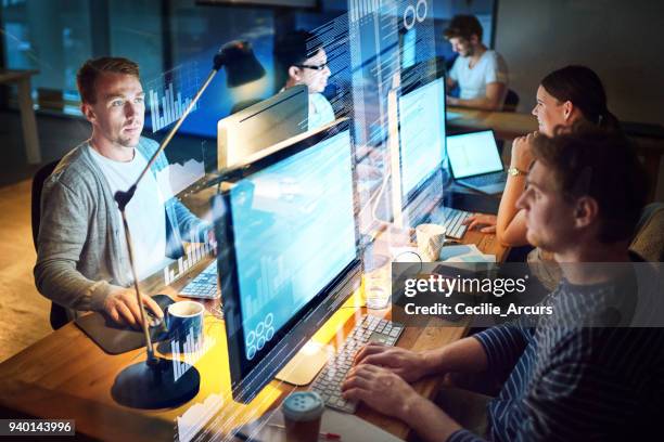 teamwork makes the code work - programming team stock pictures, royalty-free photos & images