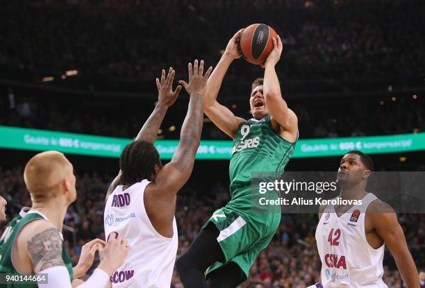 Edgaras Ulanovas, #92 of Zalgiris Kaunas competes with Kyle Hines, #42 of CSKA Moscow in action during the 2017/2018 Turkish Airlines EuroLeague...