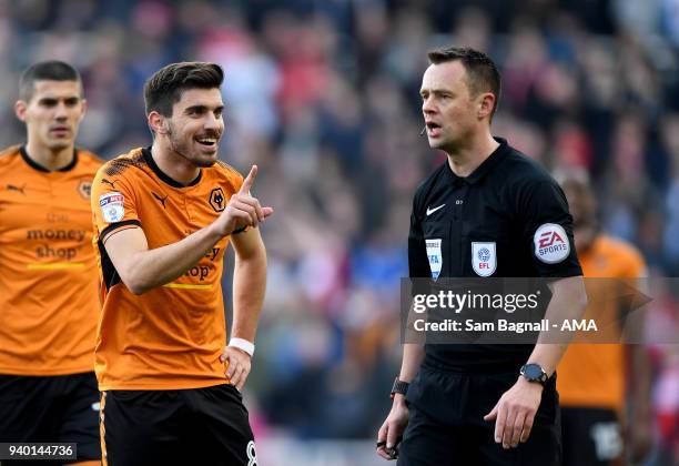 Ruben Neves of Wolverhampton Wanderers looks on is surprise at a decision made by referee Stuart Attwell during the Sky Bet Championship match...