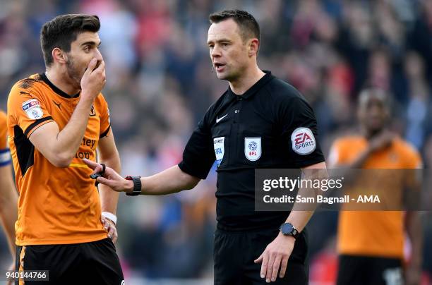 Ruben Neves of Wolverhampton Wanderers looks on is surprise at a decision made by referee Stuart Attwell during the Sky Bet Championship match...