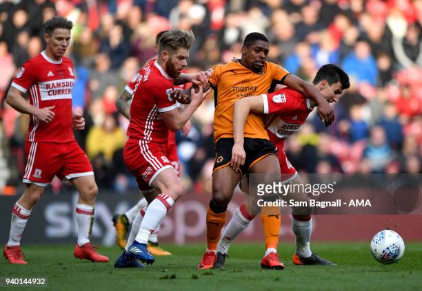 Adam Clayton of Middlesbrough, Ivan Cavaleiro of Wolverhampton Wanderers and Daniel Ayala of Middlesbrough during the Sky Bet Championship match...