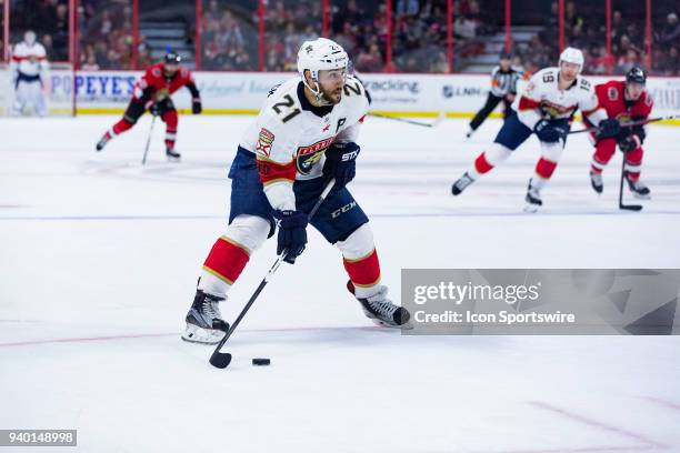 Florida Panthers Center Vincent Trocheck looks at this options with the puck during third period National Hockey League action between the Florida...