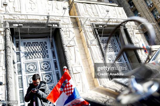Croatian flag on the Ambassador's car is seen in front of Russian Foreign Ministry building in Moscow, Russia on March 30, 2018. The countries that...